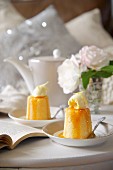 Lemon sponge pudding with vanilla ice cream (England)