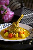 Lamb shank with curried vegetables