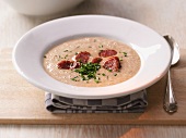 Bread soup with sausage and chives