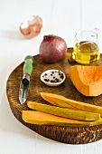 Kürbis, Gewürzmischung, Olivenöl und Zwiebel