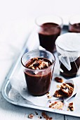 Chocolate and olive oil mousse with spicy pecan nuts