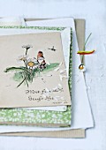 Vintage postcards and daisy petals