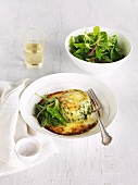 Double-baked cheese souffle with spinach