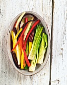 Assorted Vegetable Sticks in an Oval Dish; From Above