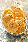 Puff pastries with salami and cheese