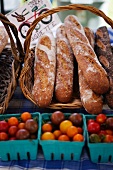 Baguettes and Tomatoes at an Outdoor Market