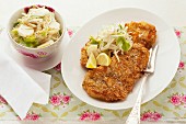Schnitzel with almond breadcrumbs and a side salad