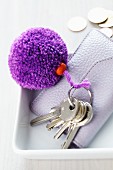 Keys with pompom on key ring