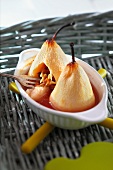 Baked pears filled with almonds and raisins