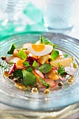 Potato salad with radish, beetroot and egg