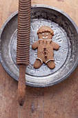 Decorated Gingerbread Man Cookie with a Glass of Milk