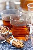 Winter tea, cinnamon sticks and sweets