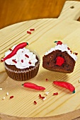 Chilli and chocolate muffins with chilli peppers made of marzipan
