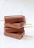 Home-made chocolate ice lollies, stacked