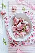 Raspberries coated in meringue