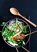 Rice noodle soup with pork, sprouts and coriander leaves (Vietnam)