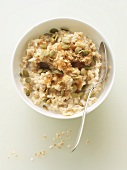 Bowl of Gluten Free Oatmeal with Pumpkin Seeds, Brown Sugar and Cream; From Above