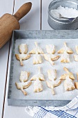 Tulip-shaped puff pastry biscuits with icing sugar