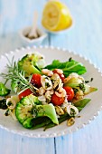 Tomato and broccoli salad with seafood