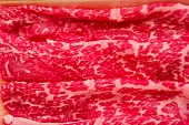 Wafer-thin sliced Wagyu beef (close-up)