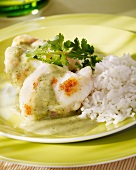 Monkfish with coriander and coconut sauce and rice