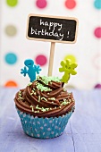 A chocolate cupcake for a child's birthday