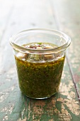 Basil pesto with pine nuts in a glass