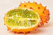A horned melon cut lengthways (cucumis metuliferus)