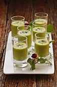 Several glasses of pea soup