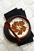 Creamy coffee dessert decorated with a pattern