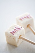 Marshmallows decorated with writing