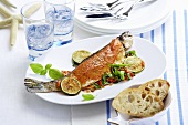 Trout stuffed with red pesto and rocket