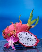 Whole and halved dragon fruit