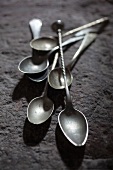 Antique spoons of assorted sizes