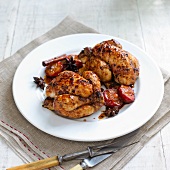 Roasted poussin with star anise, cinnamon and plums