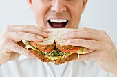 A man eating a sandwich