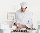 Male pastry chef in kitchen