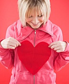 Woman holding felt heart