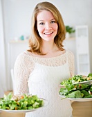 Woman serving salad