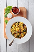 Linguine with dried tomatoes, spinach and gorgonzola