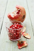 Pomegranate seeds and a pomegranate