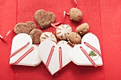 Assorted Christmas cookies with heart shaped boxes