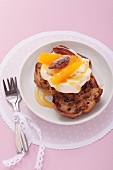 Banana bread with clotted cream and oranges