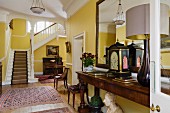 Antique furnishings in foyer of 18th century English country house