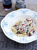 Penne with ham, red onions and ricotta