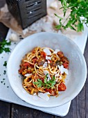 Spaghetti with vegetable sauce and parmesan