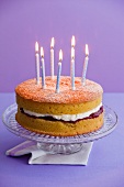 Victoria sponge with candles for a birthday