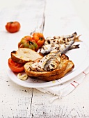 Grilled sardines and tomatoes
