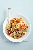 Tagliatelle with smoked ham, courgette and cherry tomatoes