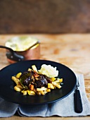 Venison ragout with mashed potato and quince jelly